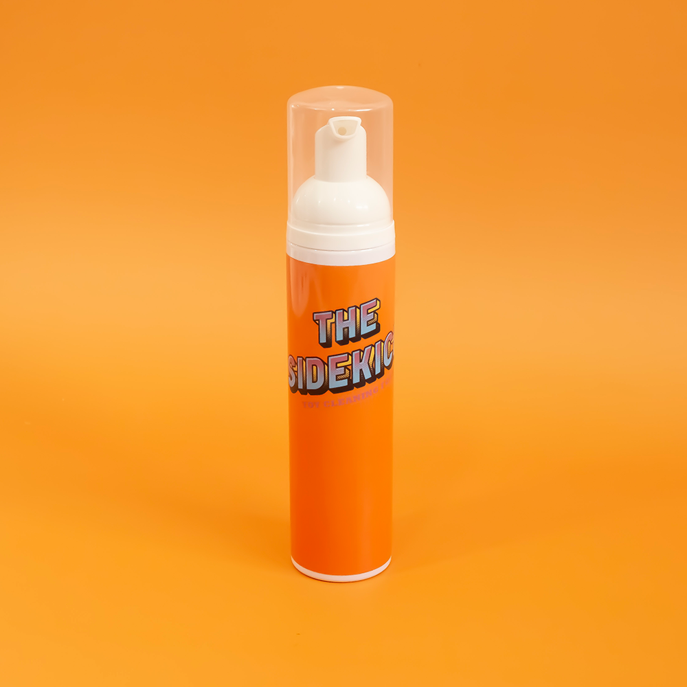 Orange bottle of foam adult toy cleaner.