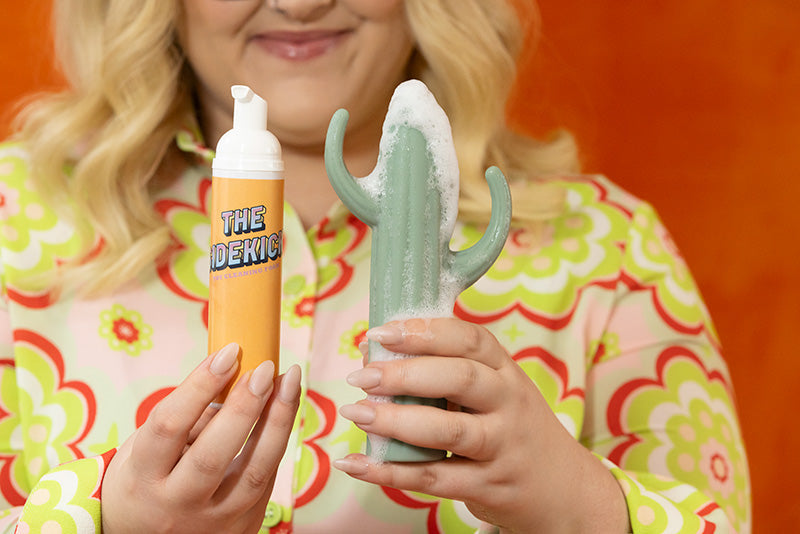 Adult toy cleaning foam and a cactus shaped vibrator with toy cleaning foam applied. 